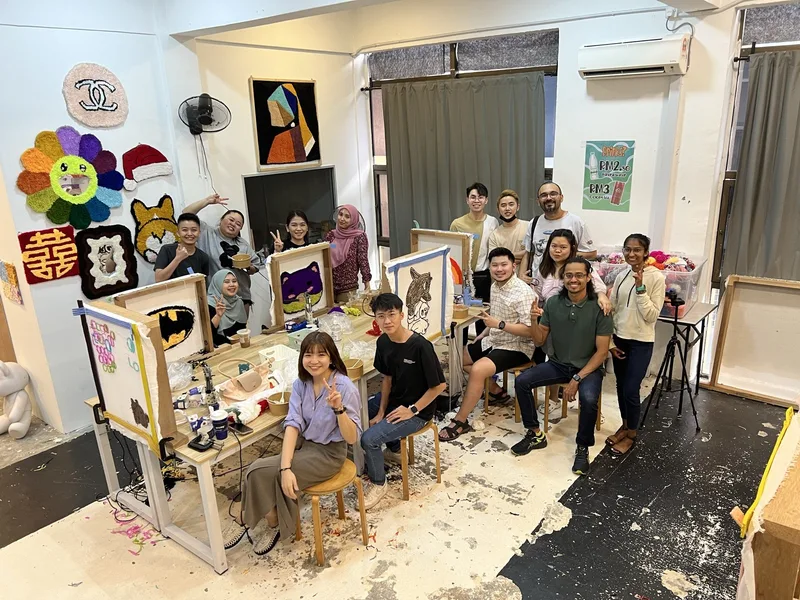 A big group with their tufting frames at our studio